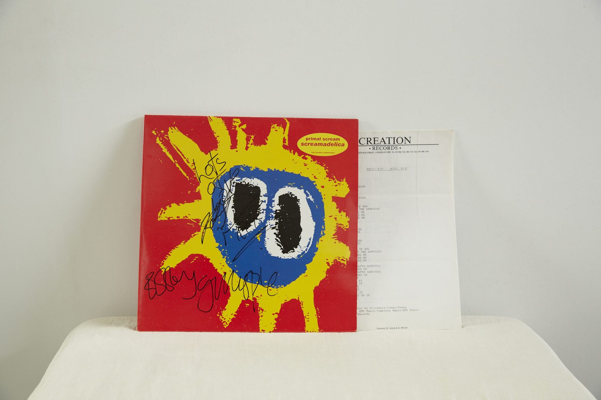 Screamadelica autographed by the members of the band, including Bobby Gillespie