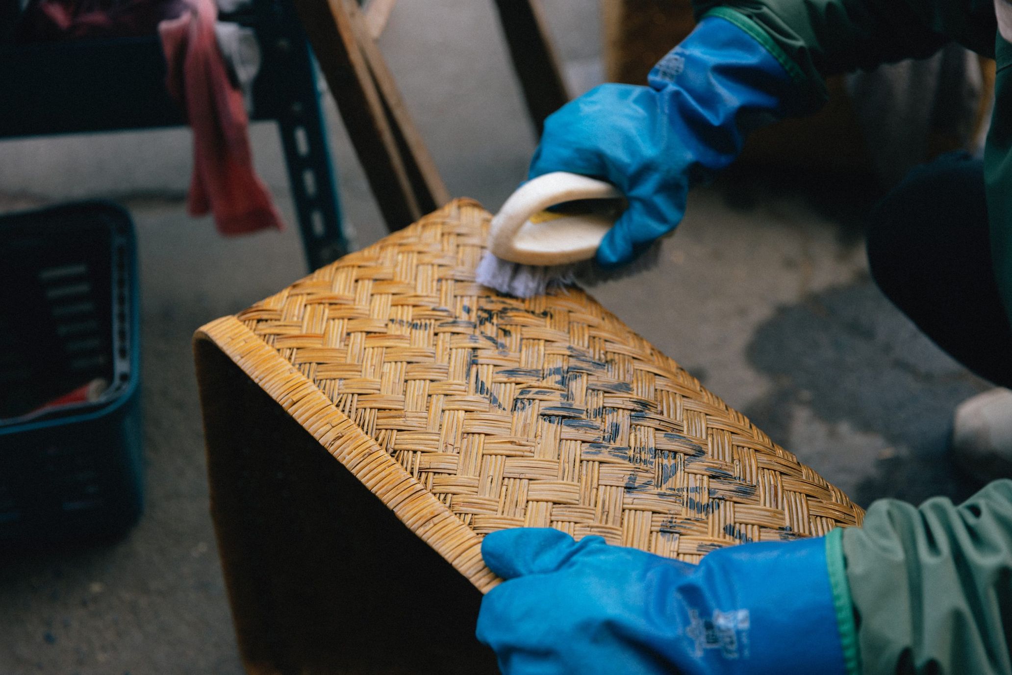 Reclaimed materials and antique tools are manually cleaned meticulously one by one by staff and supporters
